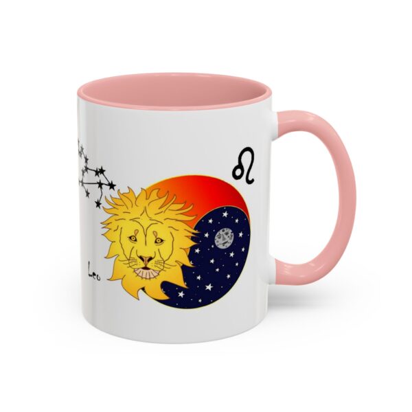 A pink and white mug with an illustration of the sun, moon and stars.