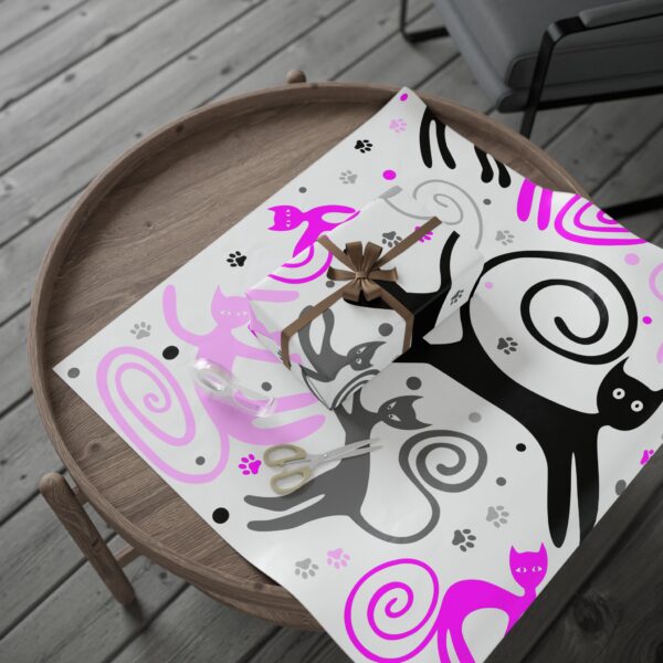 A painting of cats with pink and black swirls on it.