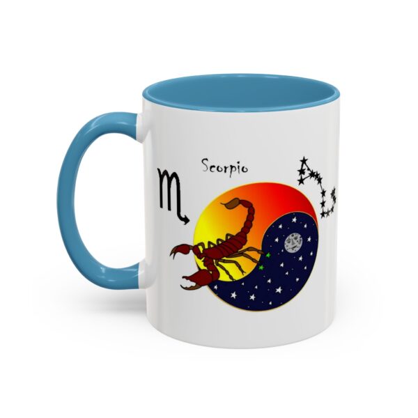 A blue and white mug with an image of scorpio