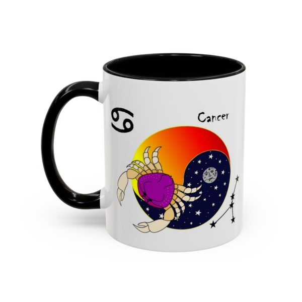 A black and white coffee mug with a picture of a scorpio.