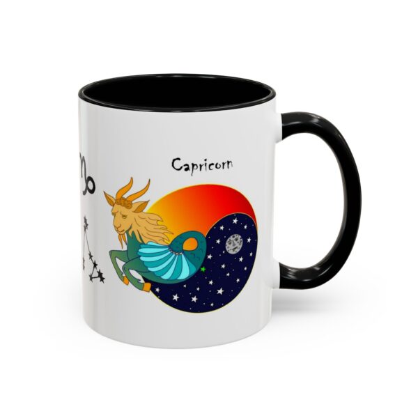 A black and white coffee mug with an astrology design.