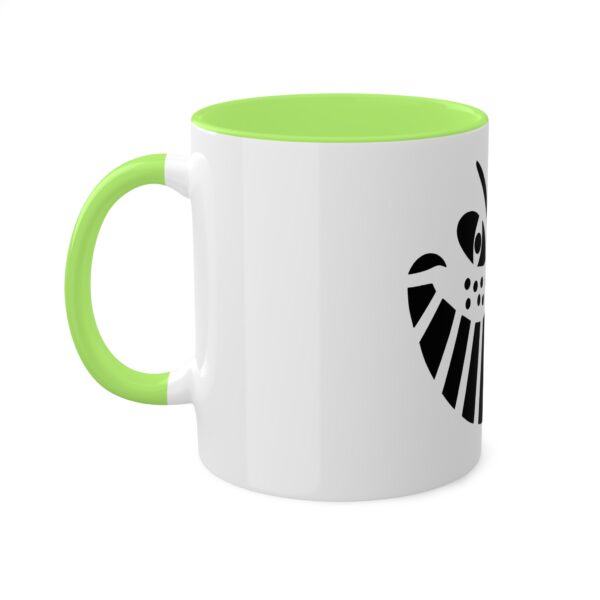 A green and white mug with the symbol for the phoenix.