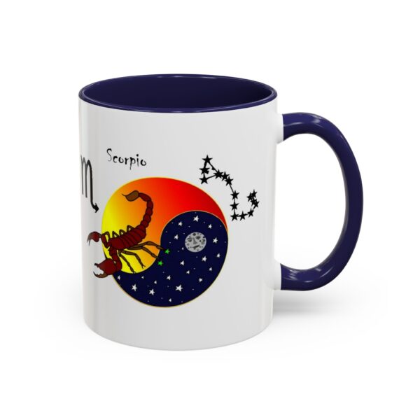 A blue and white mug with an image of scorpio on it.