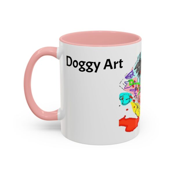 A pink and white mug with the words doggy art on it.