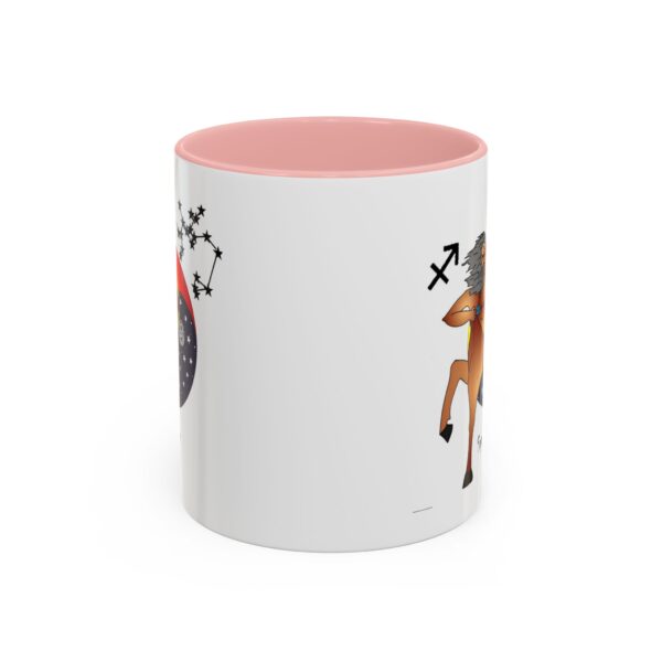 A pink and white mug with a picture of a horse.