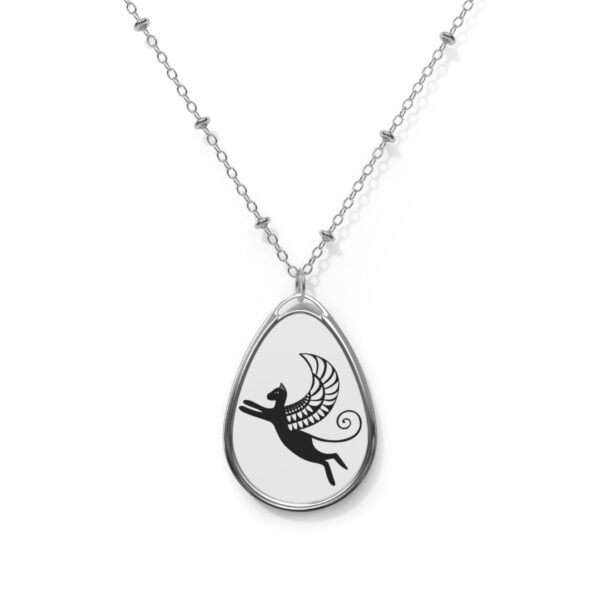 A silver necklace with an image of a fairy.