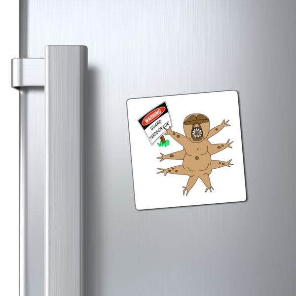 A refrigerator magnet with an image of a naked man.