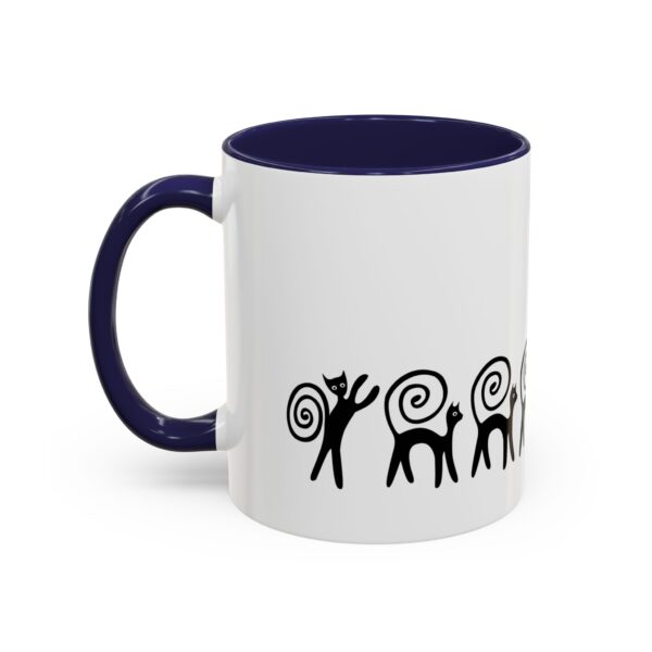 A mug with an image of two monkeys on it.