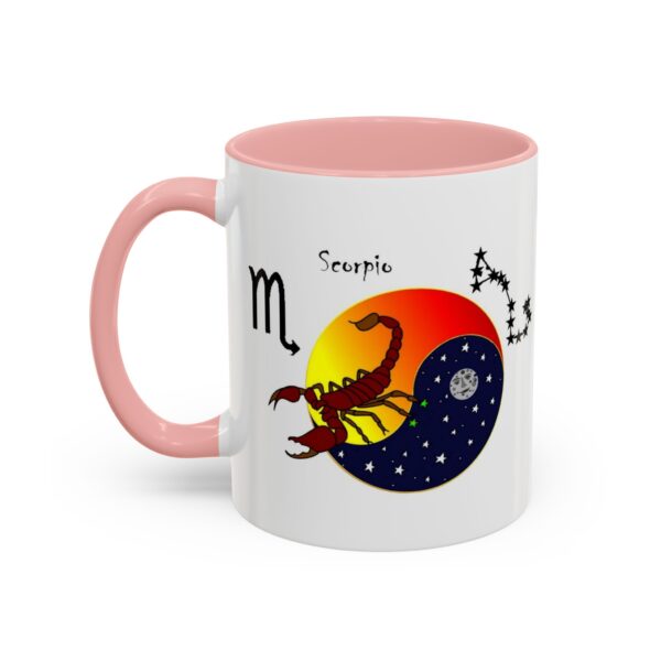 A pink and white mug with an image of scorpio