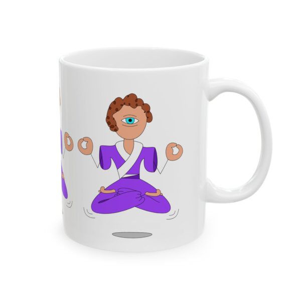 A mug with an image of a person in yoga poses.