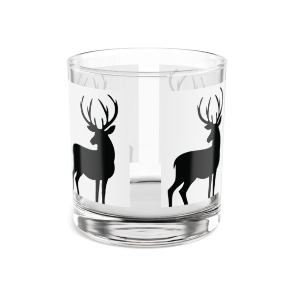 A glass with deer on it