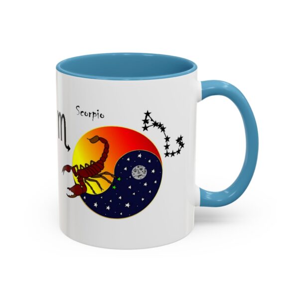 A blue and white mug with an image of scorpio on it.