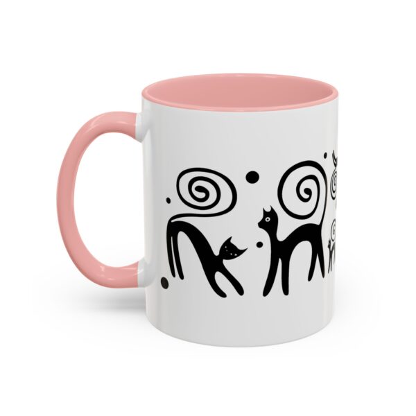 A pink and white mug with an abstract design.