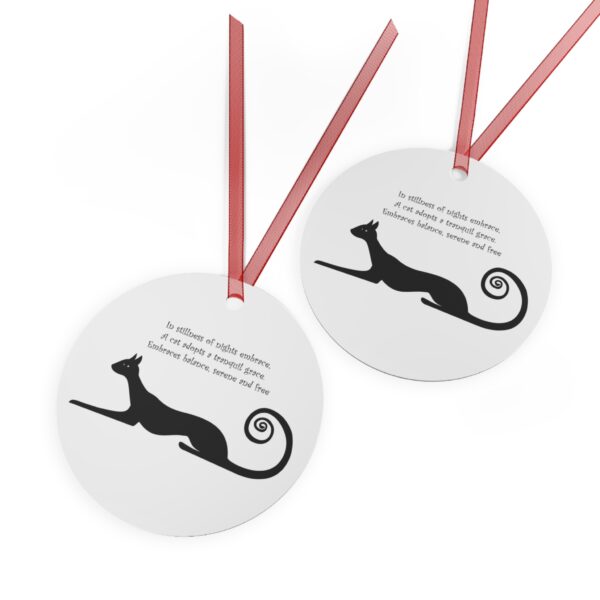 A pair of round tags with a greyhound dog on them.