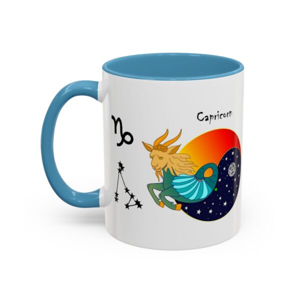 A blue and white mug with an illustration of capricorn