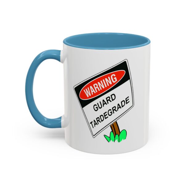 A blue and white mug with a sign saying warning guard turregrade