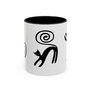 A black and white mug with a cat design.