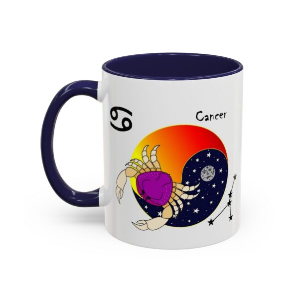 A mug with the zodiac sign cancer on it.