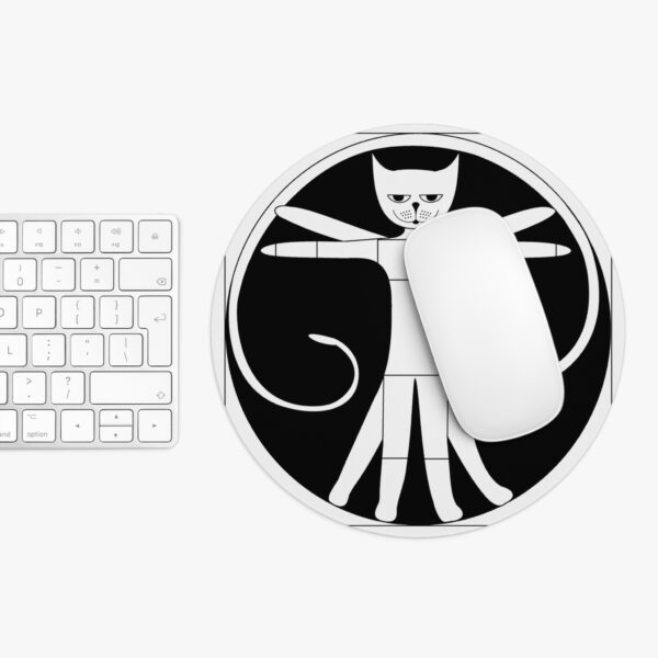 A mouse pad with an image of a cat and a keyboard.