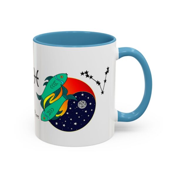 A blue and white mug with an illustration of a space ship.