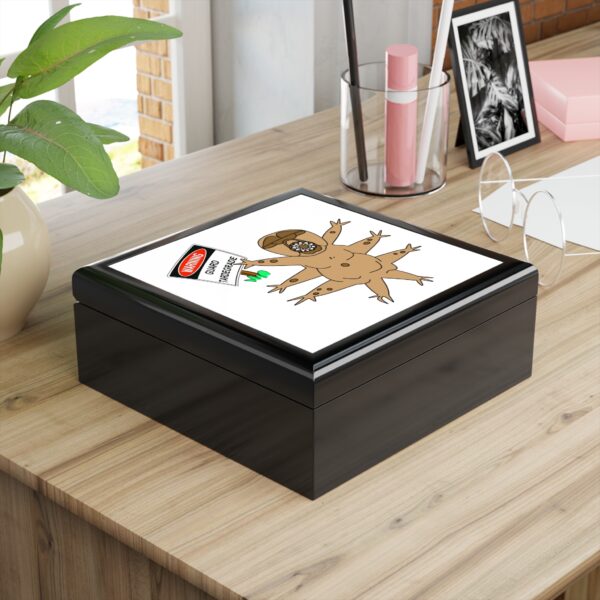 A wooden box with a picture of a person on it.