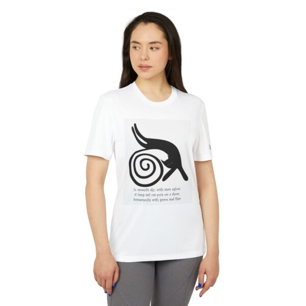 A woman wearing a white t-shirt with an image of a spiral.