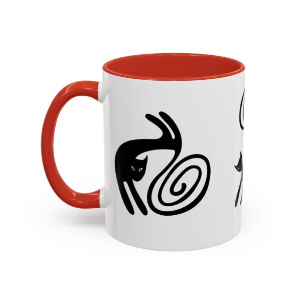 A red and white mug with an image of a person