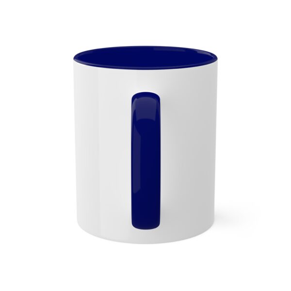 A white and blue mug with the handle up.