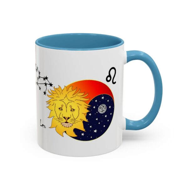 A blue and white mug with an image of the sun, moon and stars.