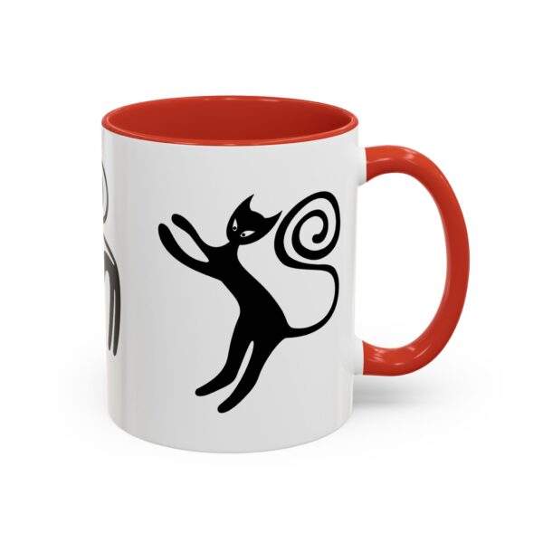 A red and white mug with an image of a cat.