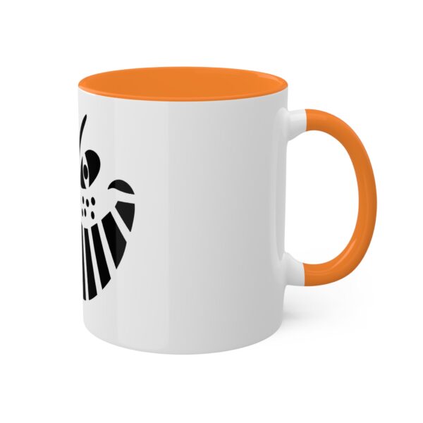 A white and orange coffee mug with an image of the symbol for the marvel comics.