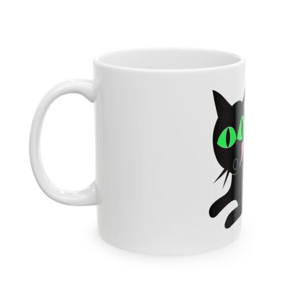 A white mug with a cat on it