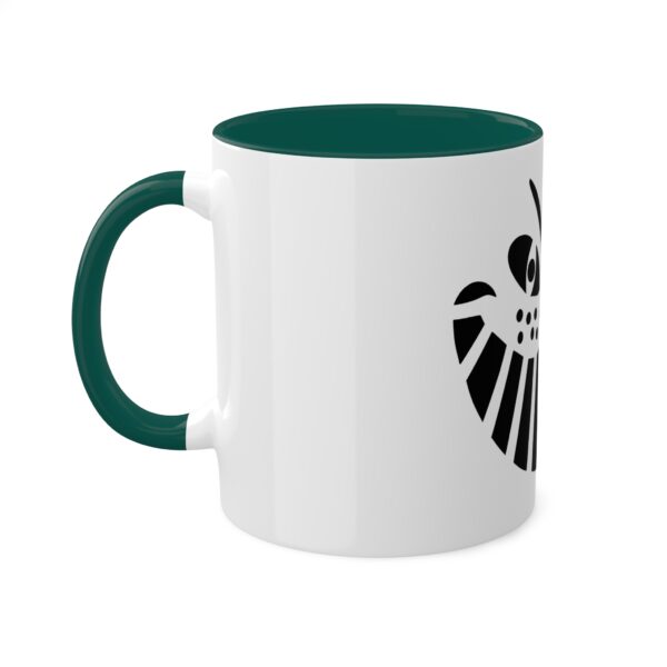 A green and white coffee mug with the symbol for cthulhu.