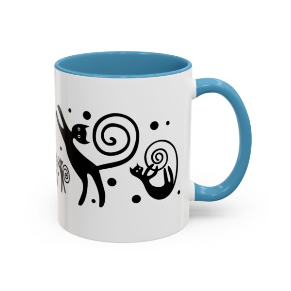 A blue and white mug with an animal design