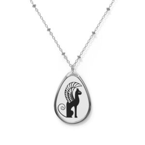 A necklace with an image of a cat on it.