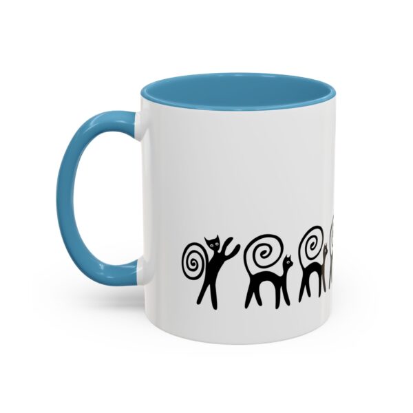 A blue and white mug with an image of a monkey.