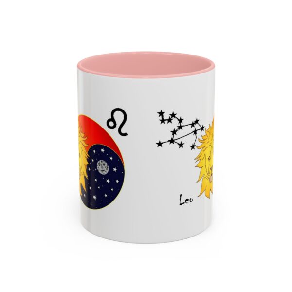 A pink and white coffee mug with an astrology design.