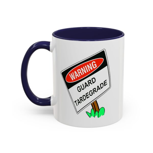 A mug with the word " warning " and a sign that reads " guard terregrade ".