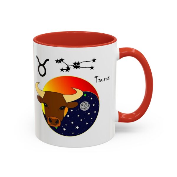 A red and white mug with an image of taurus.