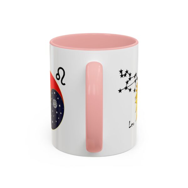 A pink and white coffee mug with an image of the zodiac.