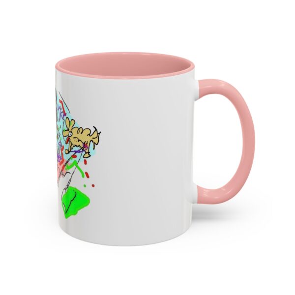 A pink and white mug with a picture of a cat on it.