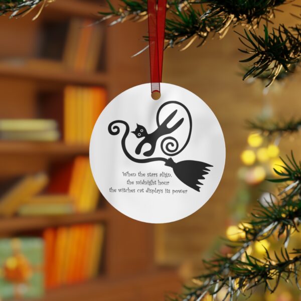 A christmas ornament hanging on the tree.