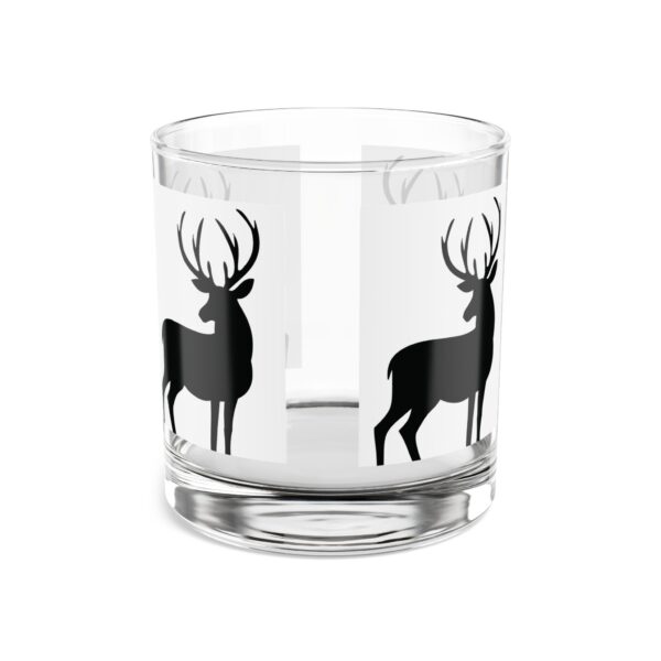 A glass with deer on it