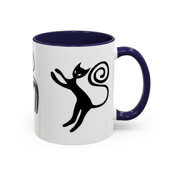 A white and blue mug with an image of a cat.