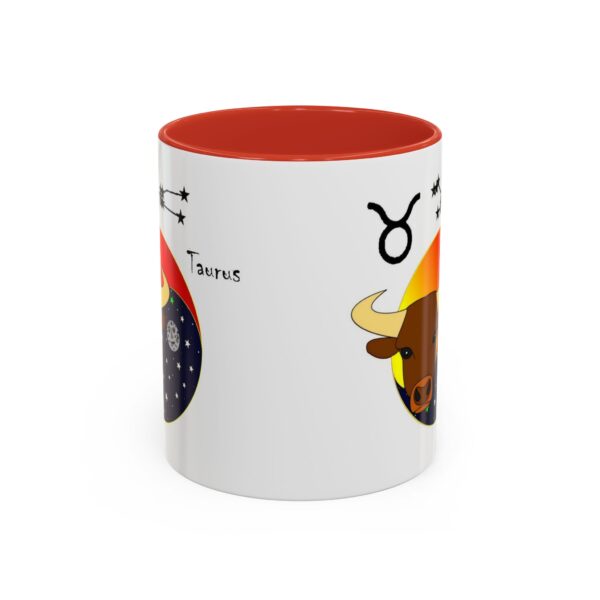 A red and white mug with an image of a bull.