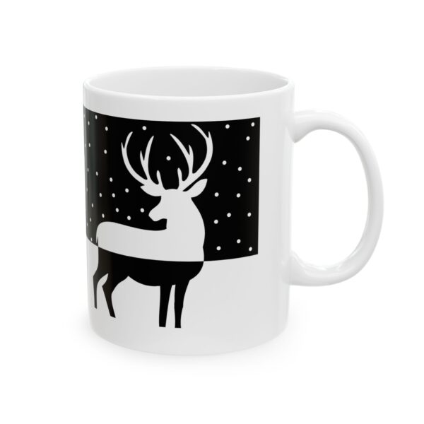 A white mug with two deer on it.