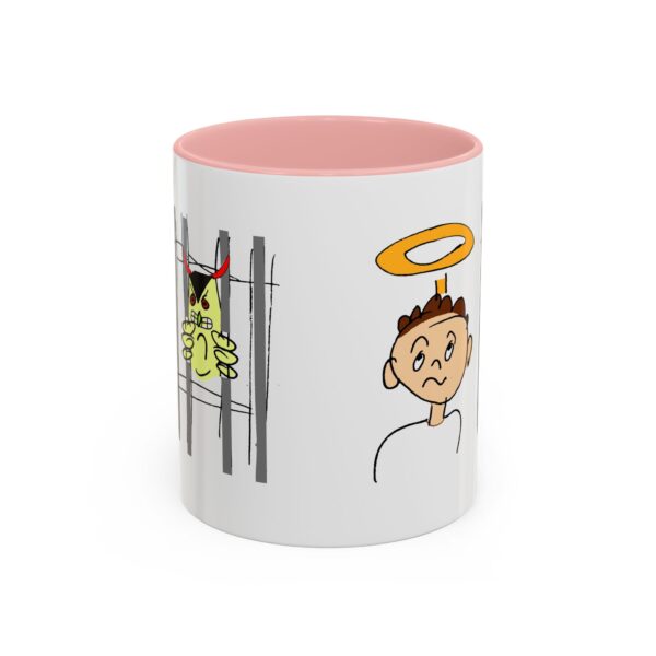 A pink and white mug with an image of a boy