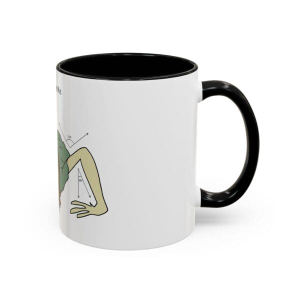 A black and white mug with a cartoon of a person doing yoga.