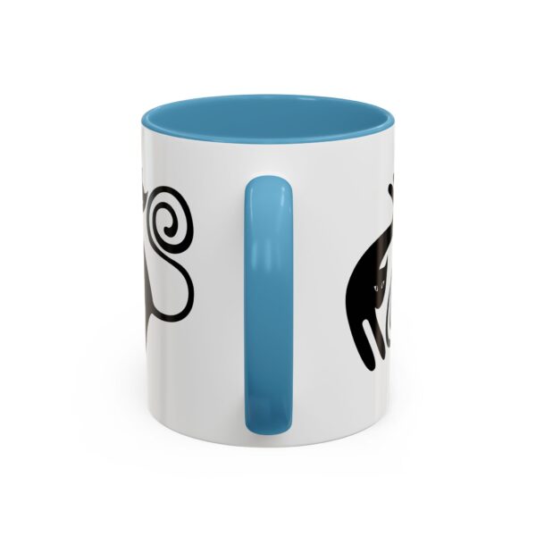 A blue and white coffee mug with a design on it.