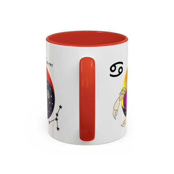 A red and white mug with an image of the zodiac sign.